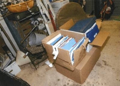 An image from the Justice Department that was included in a report by Special Counsel Robert Hur shows a damaged box where classified documents were found in U.S. President Joe Biden's garage in Wilmington, Delaware, during a search by the FBI in December 2022. 