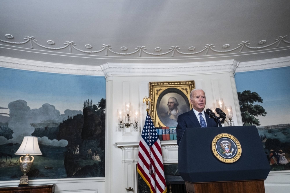 U.S. President Joe Biden answers questions from reporters at the White House in Washington on Thursday. 