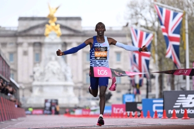 Kenya's Kelvin Kiptum wins the 2023 London Marathon on April 23, 2023. Kiptum and his coach were killed in a car accident on Sunday.