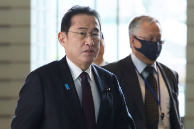 Prime Minister Fumio Kishida enters his office on Thursday.