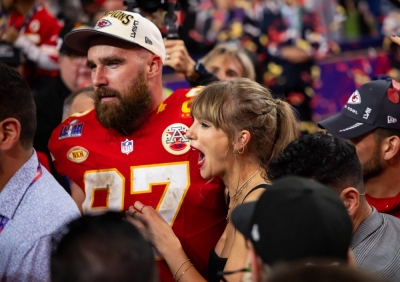 Singer Taylor Swift celebrates with Chiefs tight end Travis Kelce after Kansas City's win in Super Bowl LVIII in Las Vegas on Sunday.