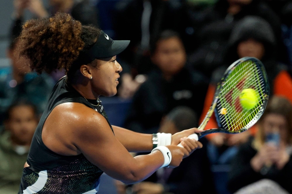 Naomi Osaka hits a return against Caroline Garcia during their match at the Qatar WTA Open in Doha on Monday.