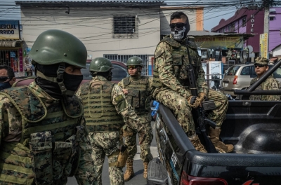 Military personnel conduct raid operations in the area surrounding Guayaquil, Ecuador on Jan. 27. President Daniel Noboa’s new war on gangs has received widespread support in a nation overwhelmed by violence, but experts warn it could endanger civil liberties.