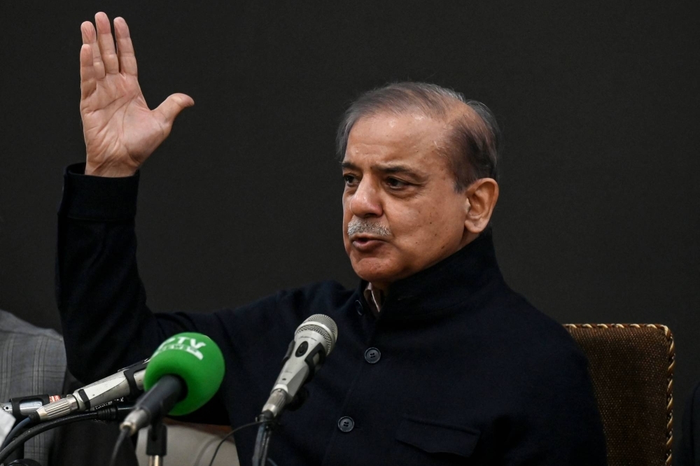 Pakistan's former Prime Minister and leader of the Pakistan Muslim League-Nawaz party Shehbaz Sharif speaks during a news conference in Lahore on Tuesday.