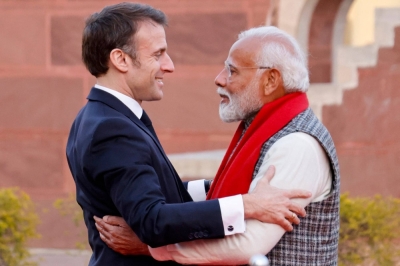 Indian Prime Minister Narendra Modi welcomes French President Emmanuel Macron as chief guest of celebrations marking India's Republic Day on Jan. 26.