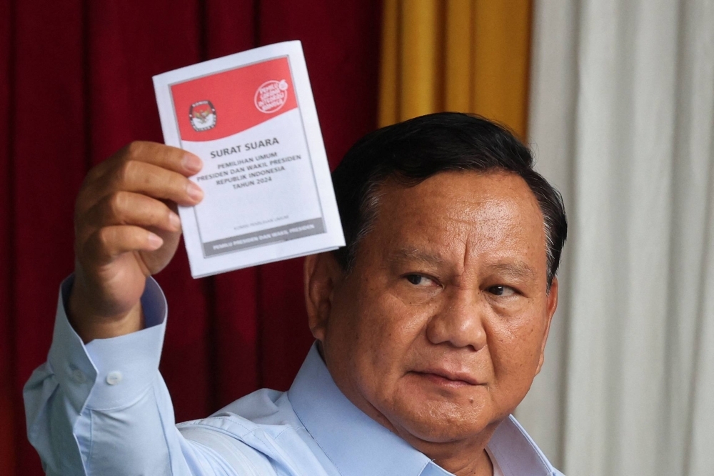 Presidential candidate Prabowo Subianto votes at a polling station during the general election in Bogor, West Java, Indonesia, on Wednesday.