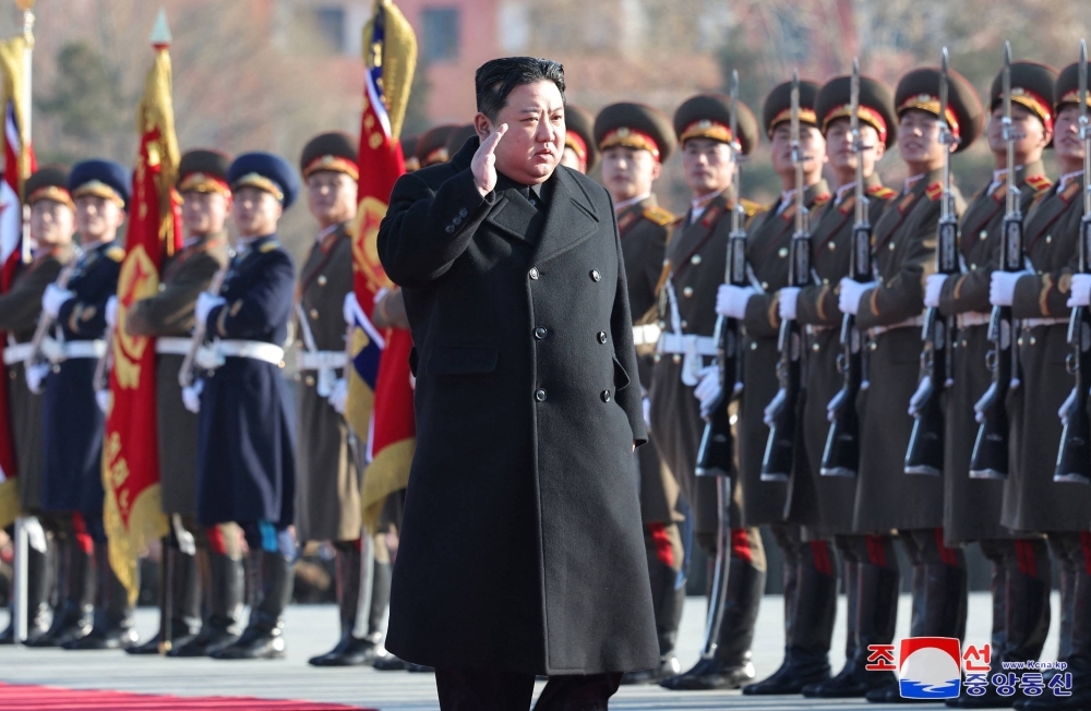 North Korean leader Kim Jong Un visits the North Korean Ministry of National Defense on the occasion of the 76th anniversary of the founding of the Korean People's Army, in Pyongyang in this picture released on Feb. 9.