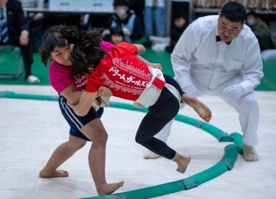Elementary, junior high and high school girls represented 76 different sumo clubs from across the nation on Sunday at the Dream Girls Cup, with the tournament also given a slight international flavor by the inclusion of one athlete from the United States and one from Brazil.