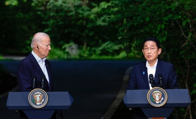 Prime Minister Fumio Kishida speaks next to U.S. President Joe Biden during a joint news conference at Camp David near Thurmont, Maryland, in August last year.