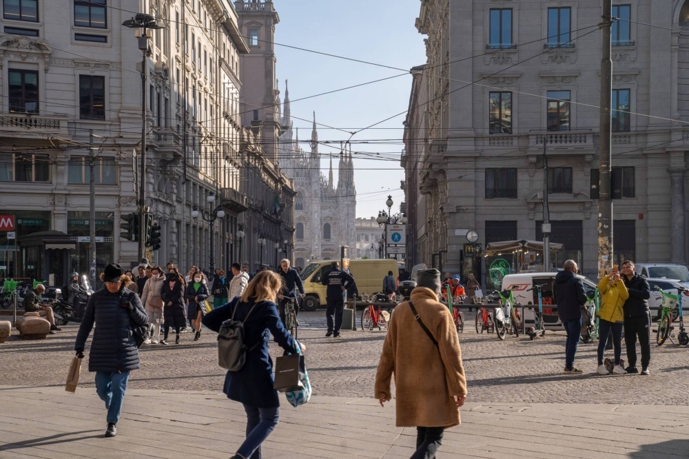 Pedestrians in Piazza Cordusio in Milan. Europe's fertility rate has been stuck around 1.5 births per woman for the past decade.