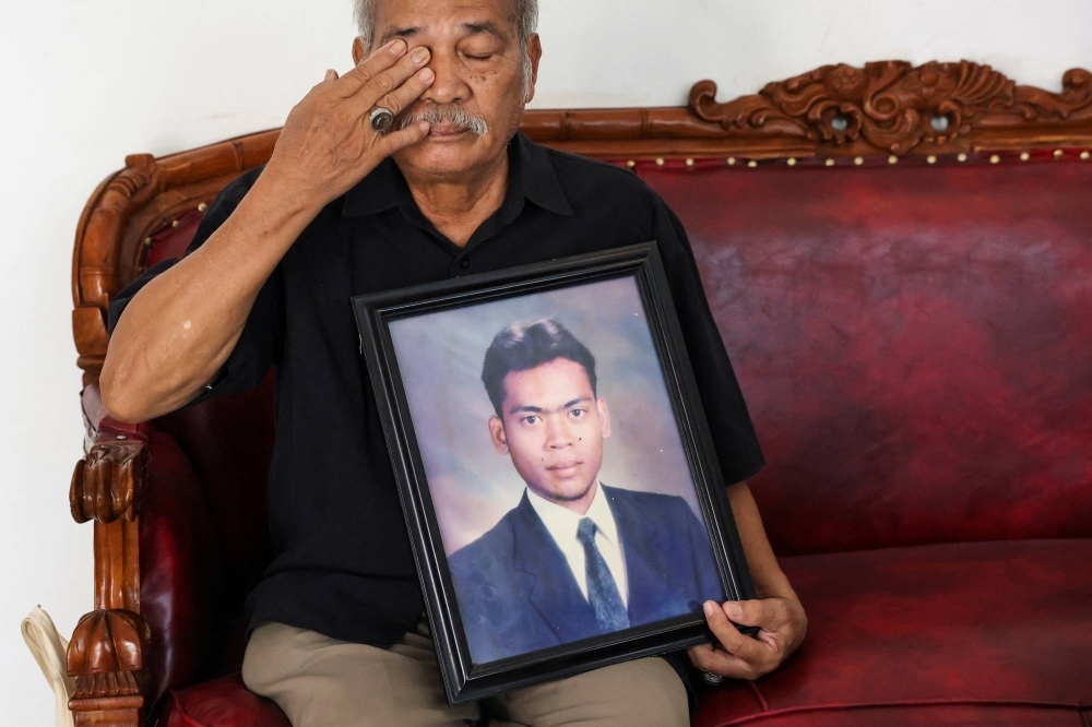 Paian Siahaan, the 77-year-old father of Ucok Munandar Siahaan who went missing during the May 1998 riots, at his house in Depok on the outskirts of Jakarta, on Thursday.