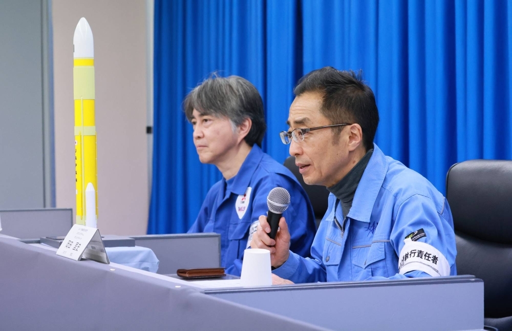 Masashi Okada, project manager in charge of H3’s development at JAXA, speaks during a news conference on Tuesday in Minamitane, Kagoshima Prefecture. 