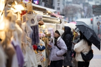 Pedestrians in Seoul in January. A survey showed that the percentage of South Korean people who have a good impression of Japan hit a record high of 44% in 2023.  | Bloomberg