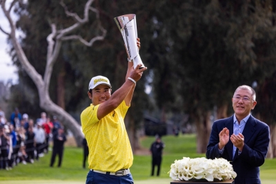 Hideki Matsuyama celebrates with the trophy after winning the Genesis Invitational at Riviera Country Club in Pacific Palisades, California, on Sunday.
