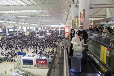 Travelers at Shanghai Hongqiao railway station on Feb. 6. For the Feb. 10-17 period, there were 99.5 million rail trips made in China, a figure 36% higher than the comparable period in 2019.