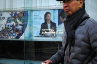 An advertisement for the Nippon Individual Savings Account (NISA) at a Mizuho Bank branch, a unit of Mizuho Financial Group, in Tokyo on Jan. 31. | Bloomberg