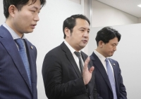 Junya Ito's lawyers speak to reporters on Monday in the city of Osaka. | Kyodo