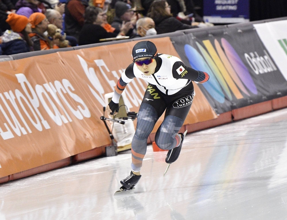 Miho Takagi competes in the 1,500-meter event at the single distance speedskating championships in Calgary on Sunday.