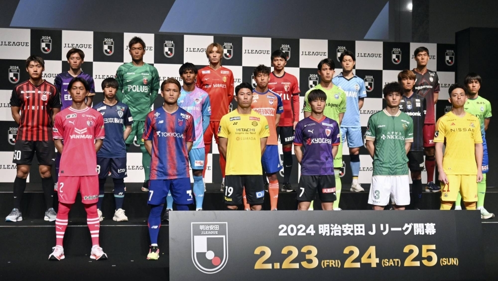 J. League first-division soccer players attend a promotional event in Tokyo on Monday, four days before the season begins.