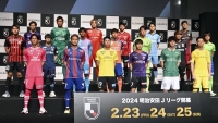 J. League first-division soccer players attend a promotional event in Tokyo on Monday, four days before the season begins. | Kyodo
