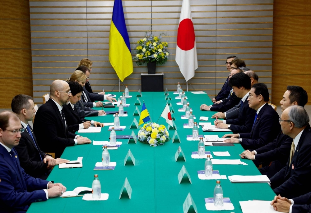 Ukraine's Prime Minister Denys Shmyhal meets with Prime Minister Fumio Kishida as a part of the Japan-Ukraine Conference for Promotion of Economic Growth and Reconstruction in Tokyo on Monday.