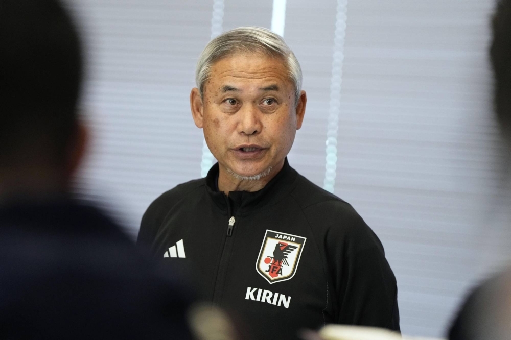 Japan Football Association executive Norio Sasaki speaks to reporters in Chiba on Tuesday.
