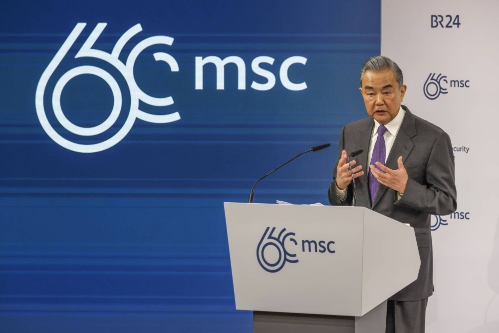 Chinese Foreign Minister Wang Yi speaks on the second day of the Munich Security Conference on Saturday.