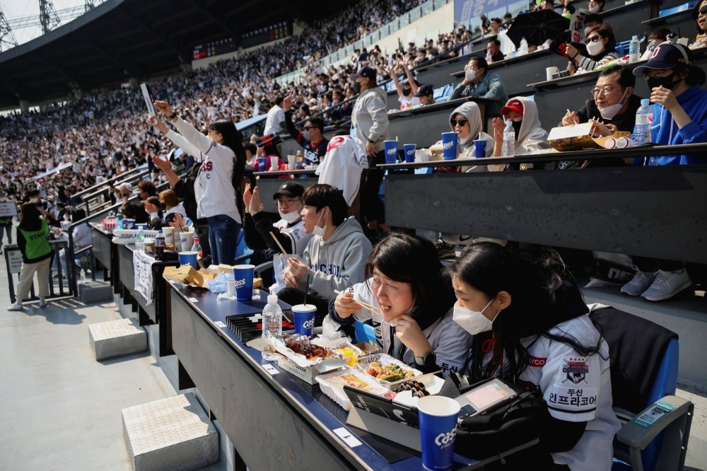 Fans during a game between the Hanwha Eagles and Doosan Bears at Jamsil Baseball Stadium in Seoul in April 2022. 