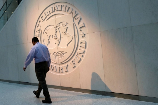 The International Monetary Fund headquarters in Washington. The IMF sees downside risks in the Japanese economy, which unexpectedly slipped into a recession at the end of last year.