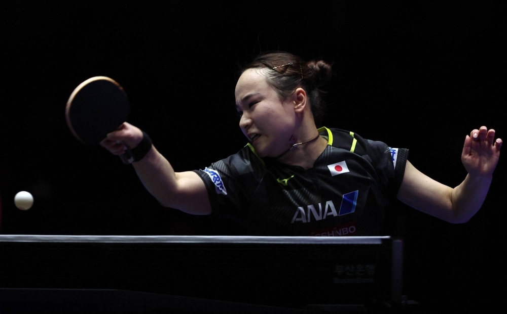 Japan's Mima Ito competes against Romania's Bernadette Szocs during the team event at the table tennis world championships in Busan, South Korea, on Thursday.