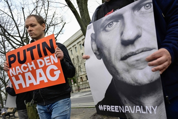 Demonstrators protest the death of Russian opposition leader Alexei Navalny in front of the Russian Embassy in Berlin on Feb. 16.