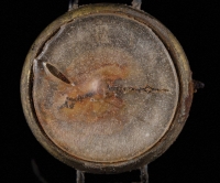 A melted wristwatch that survived the atomic bombing of Hiroshima in 1945. The hands stopped at 8:15 a.m., the exact time the bomb decimated the city.  | Nikki Brickett / AP / via Kyodo 