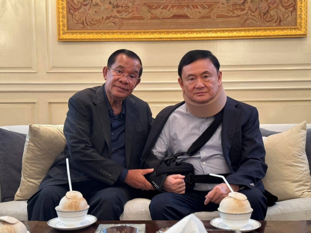 Former Cambodian Prime Minister Hun Sen with former Thai leader Thaksin Shinawatra in Bangkok on Wednesday. 