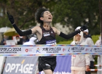 Kokugakuin University's Kiyoto Hirabayashi was the surprise winner of the Osaka Marathon on Sunday with the seventh-fastest time ever for a Japanese runner. | Kyodo 