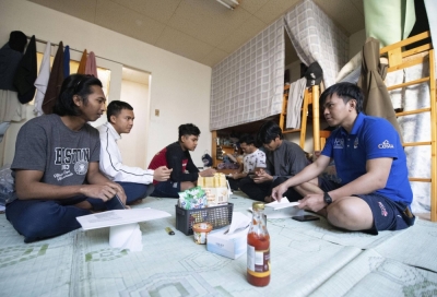 Indonesian trainees study Japanese at a dormitory in the town of Noto, Ishikawa Prefecture, on Feb. 14.