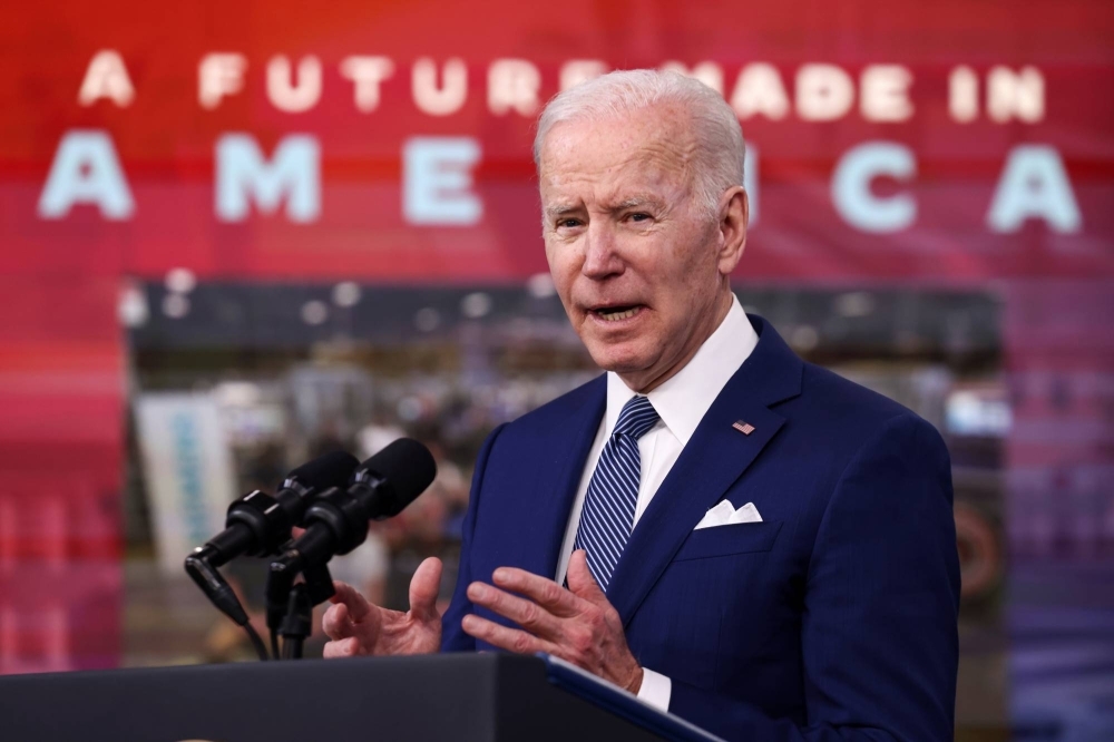 U.S. President Joe Biden announces new provisions in March 2022 requiring the government to buy more made-in-America goods.