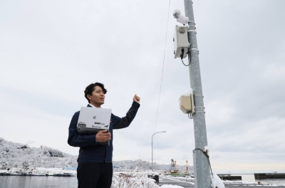 Visnu CEO Ryosuke Chiba explains an AI-equipped security camera his company is developing for the city of Kamaishi, Iwate Prefecture, on Feb. 22.