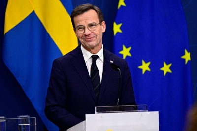 Sweden's Prime Minister Ulf Kristersson speaks during a news conference in Stockholm on Monday after Hungary's parliament voted yes to ratify Sweden's NATO accession.