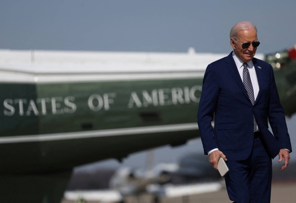 U.S. President Joe Biden walks to board Air Force One for travel to New York from Joint Base Andrews, Maryland, on Monday.