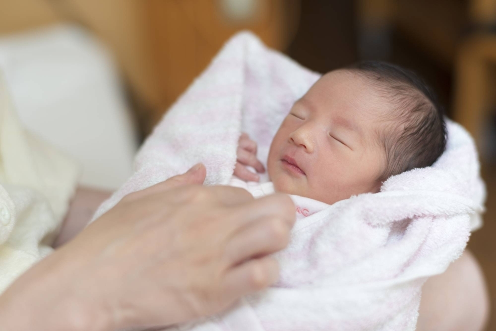 The number of babies born in Japan in 2023 fell to a record low, government data shows.