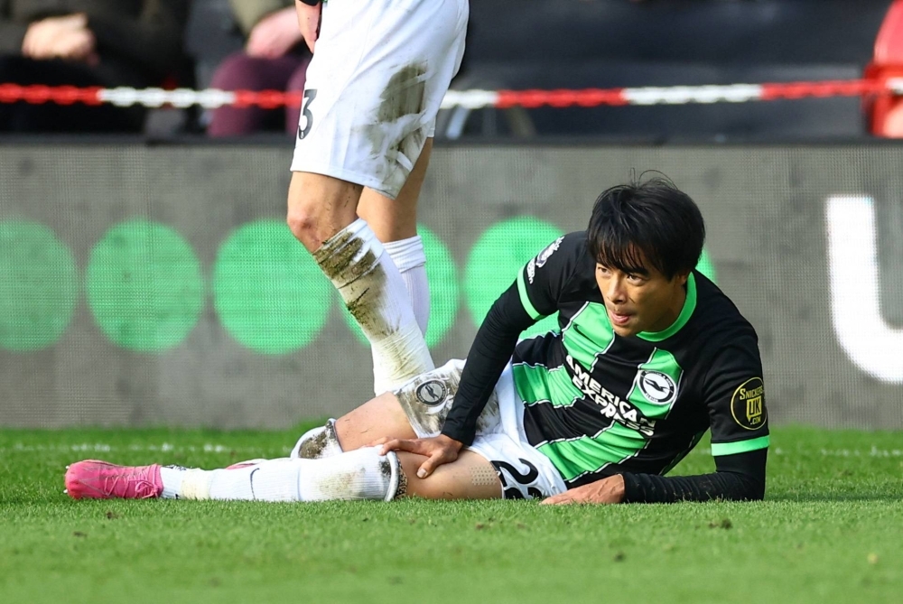 Brighton's Kaoru Mitoma after sustaining an injury in a match against Sheffield United on Feb. 18