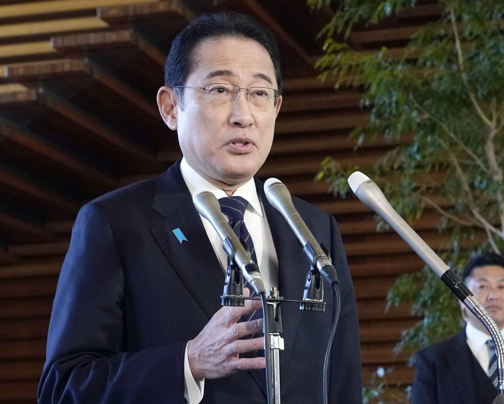 Prime Minister Fumio Kishida tells reporters that he plans to attend a Lower House ethics committee hearing, in Tokyo on Wednesday.