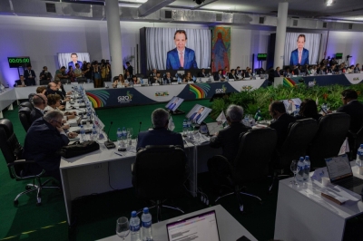 Attendees listen as Fernando Haddad, Brazil's finance minister, speaks virtually during the Group of 20 finance ministers and central bank governors meeting in Sao Paulo on Wednesday.