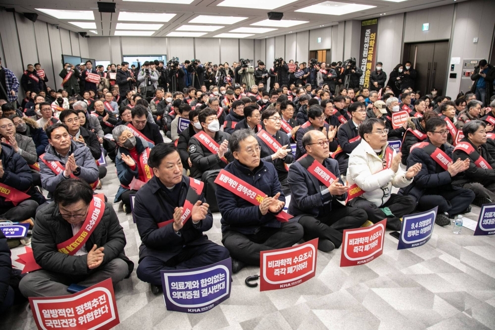 Demonstrators gather during a protest in Seoul on Sunday.