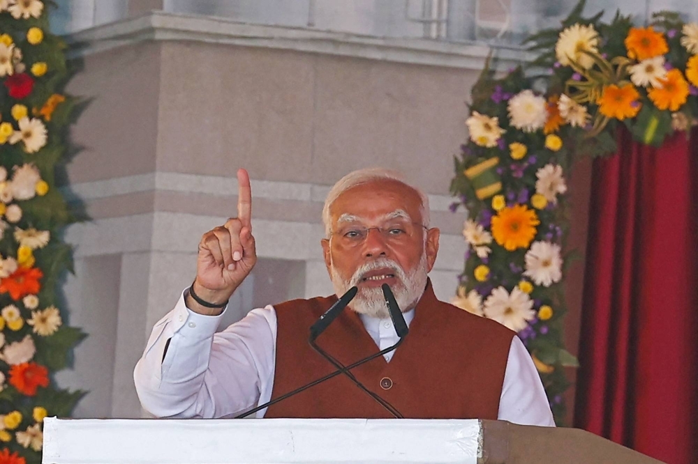 Indian Prime Minister Narendra Modi addresses the public on the outskirts of Varanasi, India, on Feb. 23.