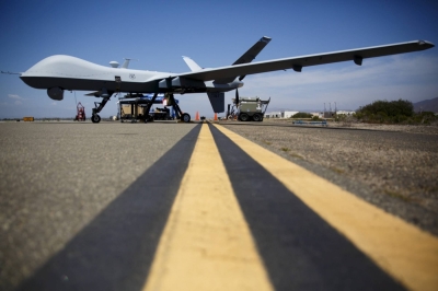 An MQ-9 Reaper drone stands on the runway at Naval Base Ventura County Sea Range, Point Mugu, near Oxnard, California. The Defense Ministry is considering purchasing the Reaper for intercepting foreign aircraft approaching Japanese airspace.