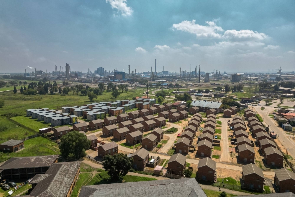 A housing development next to the Sasol’s petrochemicals plant in Sasolburg, South Africa.