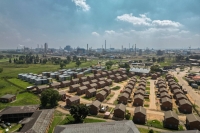 A housing development next to the Sasol’s petrochemicals plant in Sasolburg, South Africa. | Bloomberg 