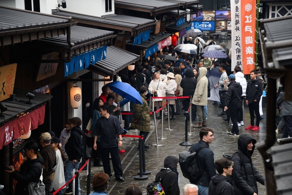 A retail shopping area in Tokyo in February. A recent bout of inflation appears to have cleared the way for Japan to officially end its war on deflation.