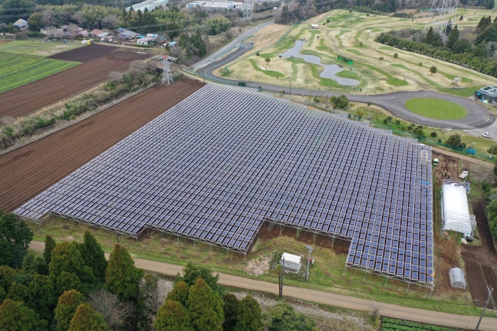 Solar panels over farmland in Chiba Prefecture in April 2022.
